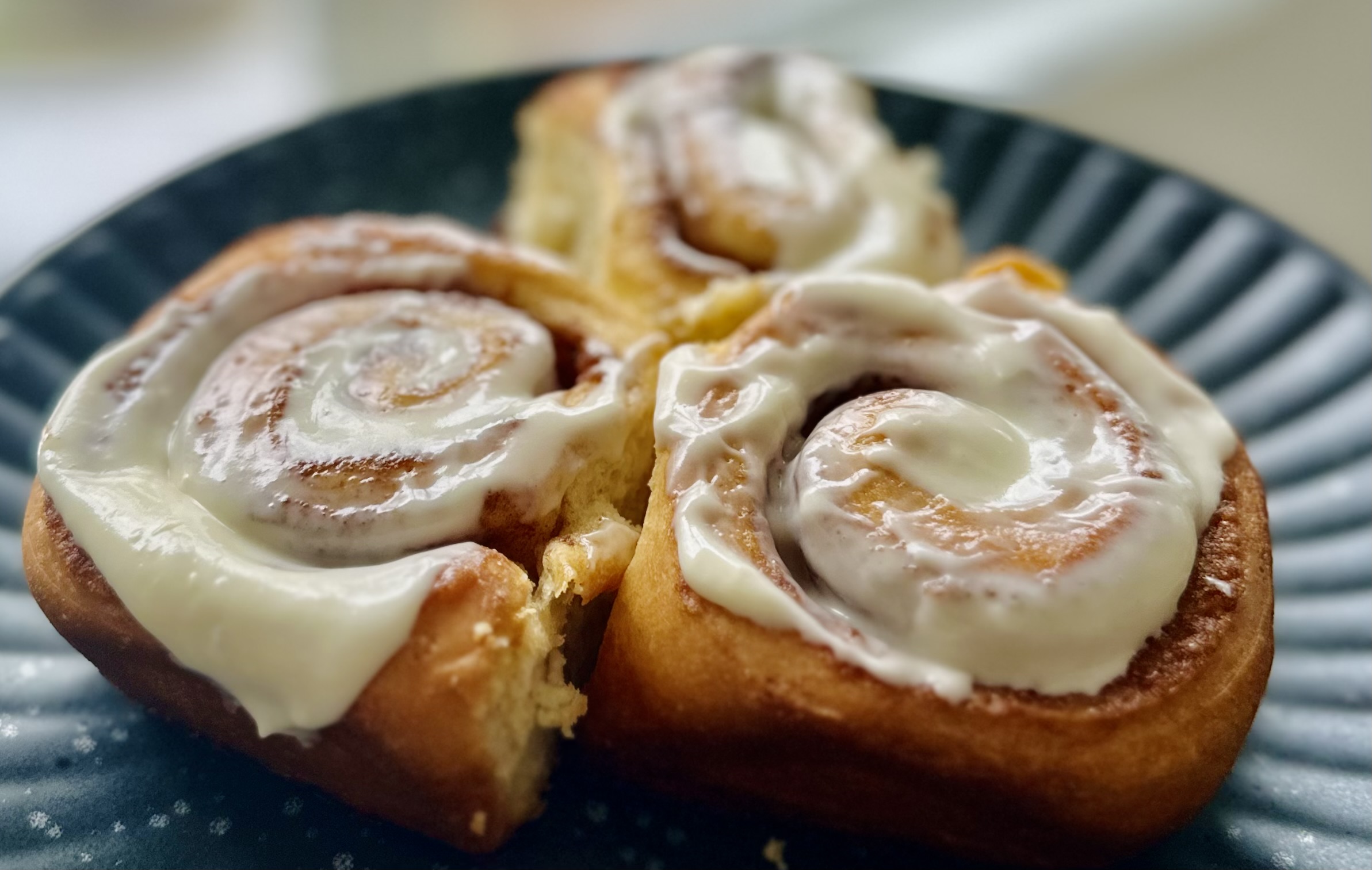 Fresh baked cinnamon rolls with homemade icing
