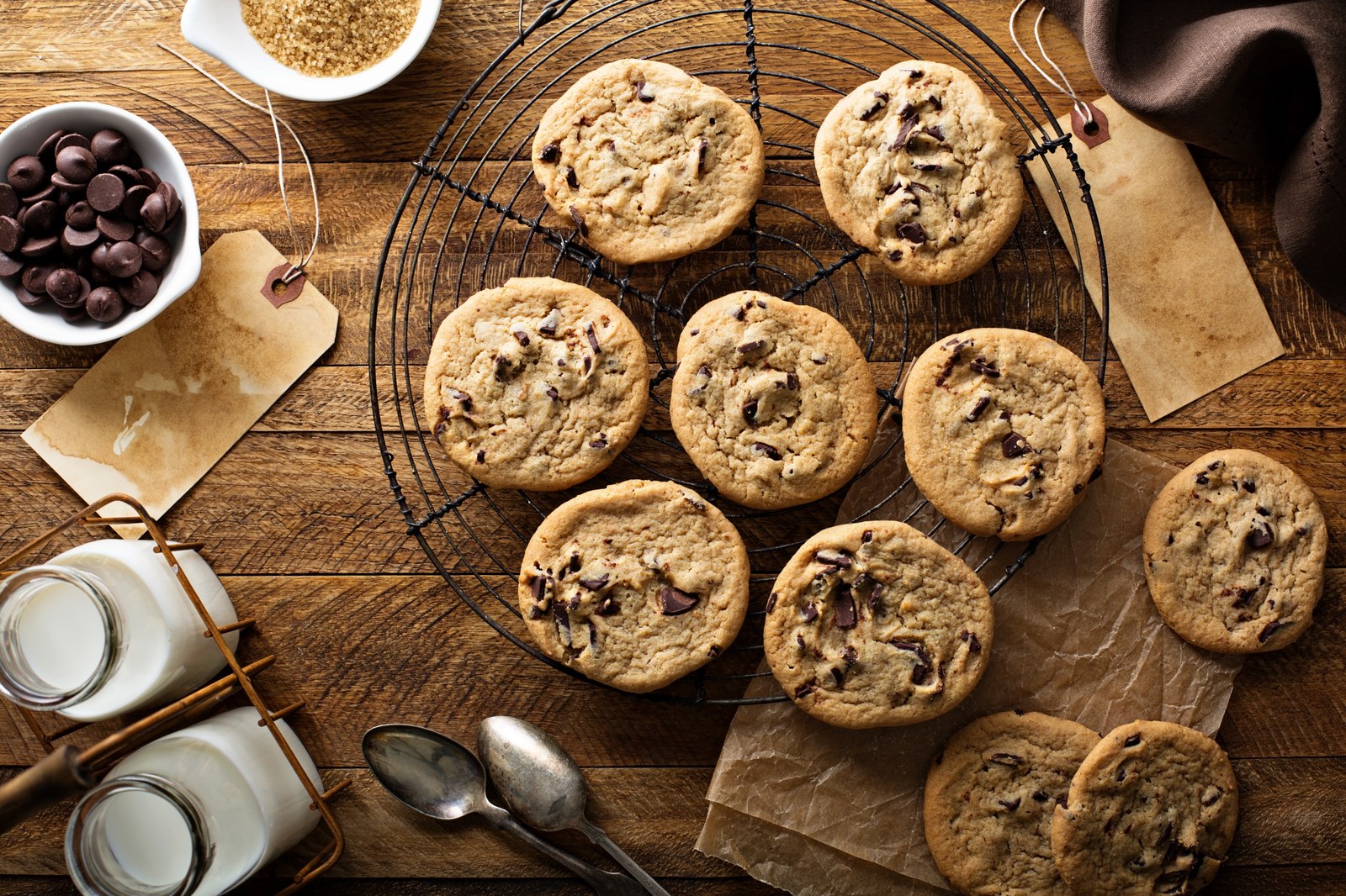 Freshly baked chocolate chip cookies on a cooling rack