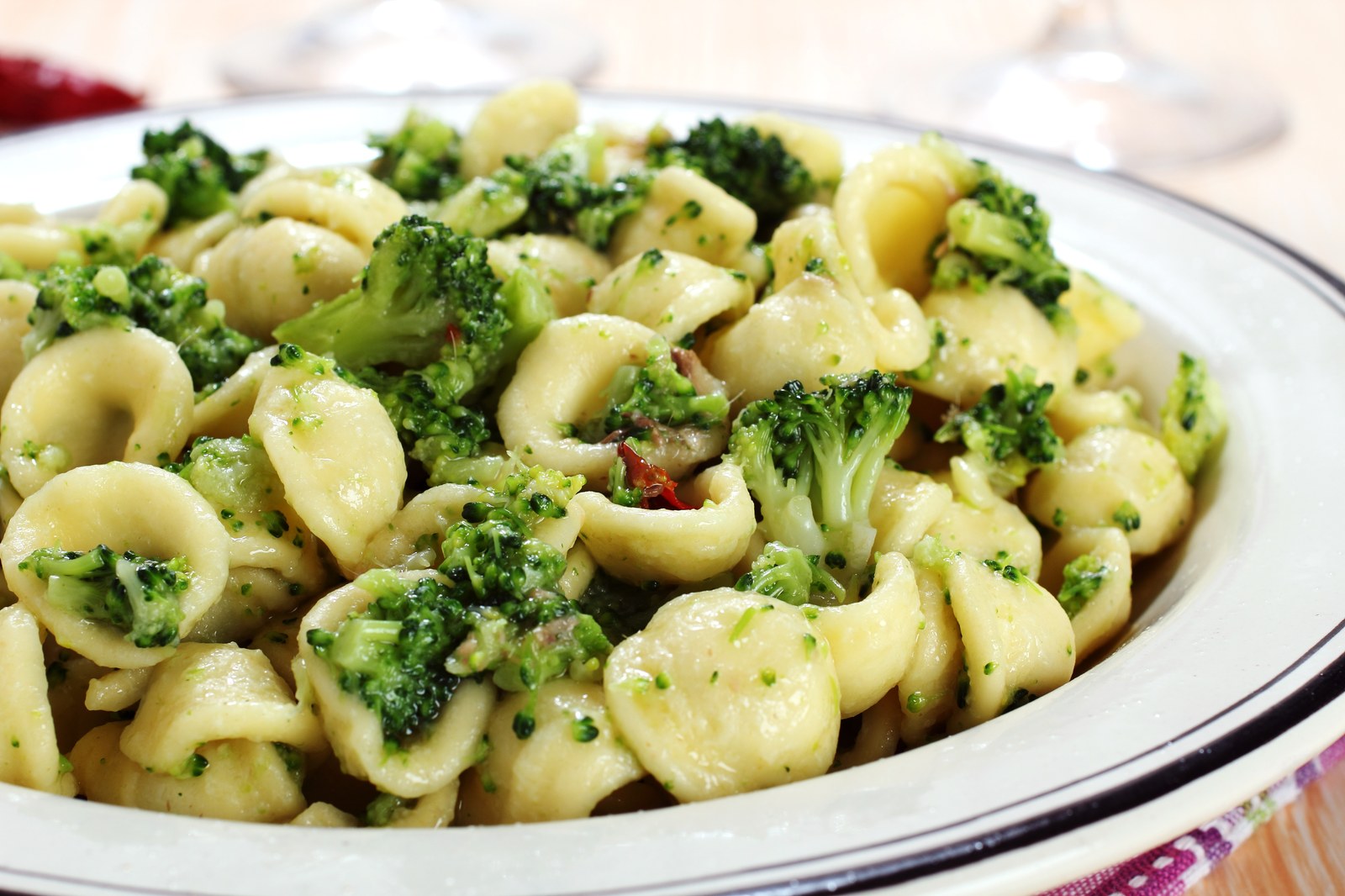 Orecchiette pasta tossed with broccoli florets in a light sauce